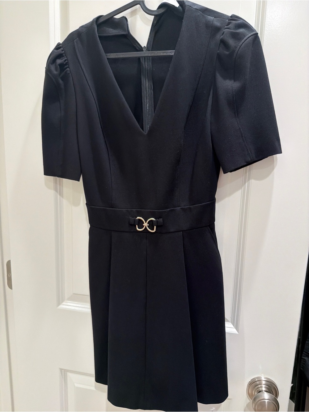 Sandro Black V‑Neck Mini Dress with Gold Accent Belt